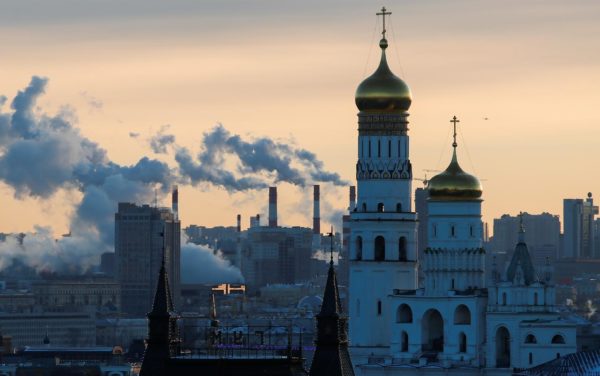 Steam rises from the chimneys of a thermal power plant behind the Ivan the Great Bell Tower in Moscow, Russia. PHOTO: REUTERS