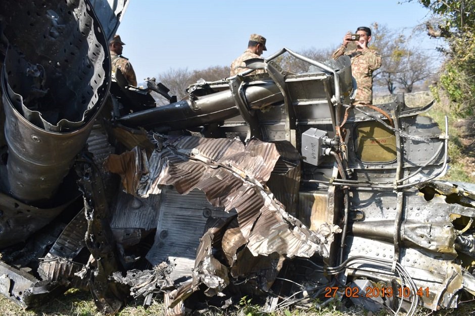 Pakistan Army inspects wreck of downed IAF jet. PHOTO: EXPRESS