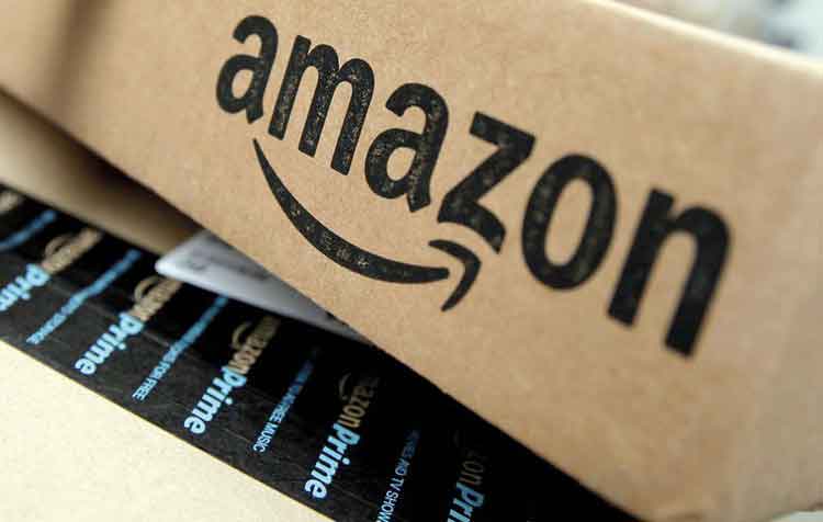 amazon raises overtime pay for warehouse workers