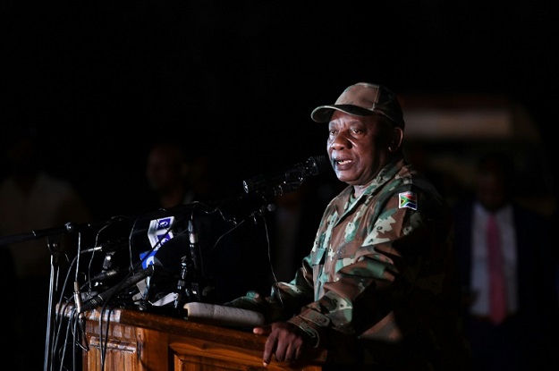 South African President Cyril Ramaphosa saw off soldiers before they deployed from a military base in Soweto township. PHOTO: AFP 