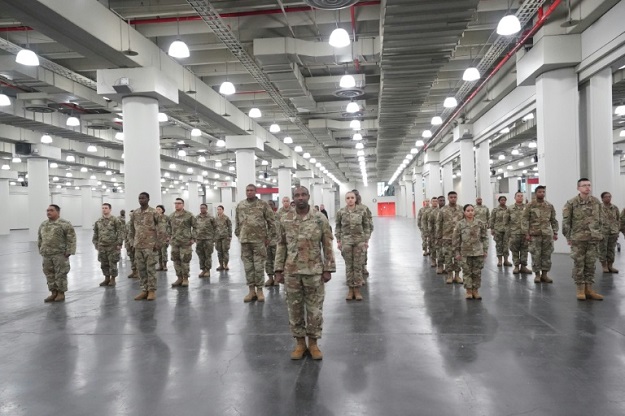 Members of the Army National Guard deploy at New York's Jacob Javits Center as New York Governor Andrew Cuomo announces plans to convert the center into a field hospital. PHOTO: AFP 