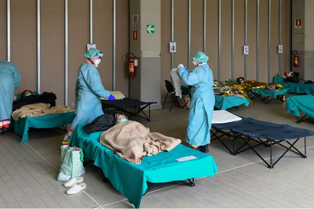 The protective gear staff have to wear means they go for hours without drinking or going to the toilet. PHOTO: AFP