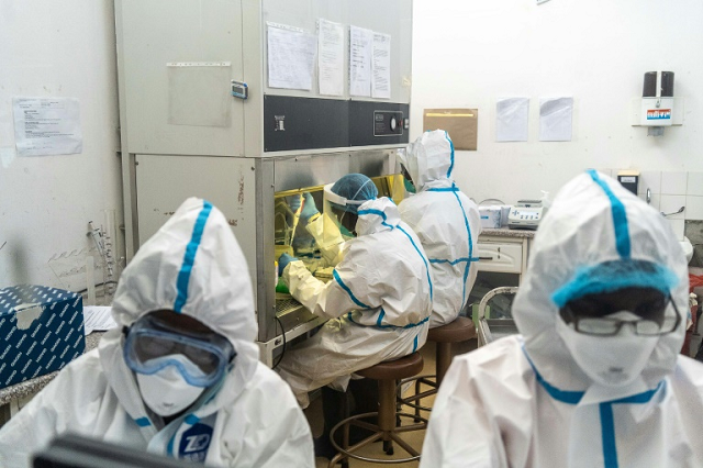 Countries are carrying out more testing in a bid to track the rate of infections. PHOTO: AFP