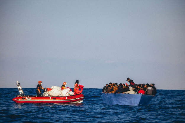A picture released by German migrant rescue NGO Sea-Eye shows an operation to rescue people in distress off the Libyan coast in April. PHOTO: AFP
