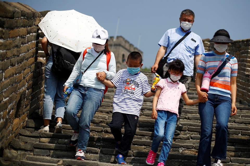 Tourists visit the Mutianyu section of the Great Wall of China on the first day of the five-day Labour Day holiday following the coronavirus disease (COVID-19) outbreak, on the outskirts of Beijing, China May 1, 2020. REUTERS/Thomas Peter