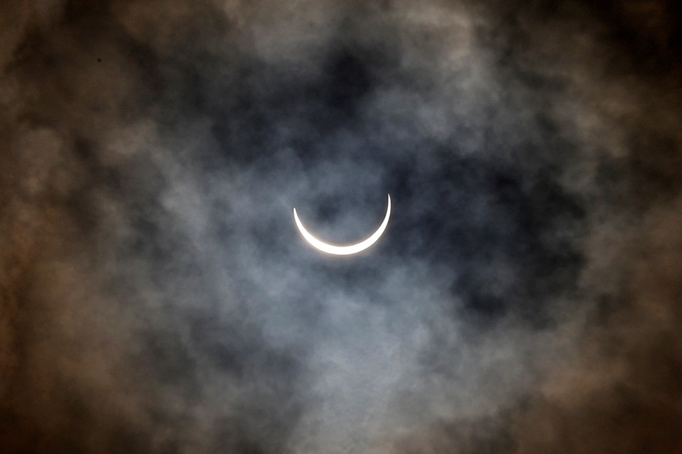 A partial solar eclipse is seen from New Delhi, India, June 21, 2020. REUTERS/Danish Siddiqui